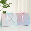 Elegant Customizable Paper Handbags for Boutique Shopping Experiences