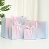 Elegant Customizable Paper Handbags for Boutique Shopping Experiences