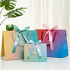 Elegant Customizable Paper Handbags for Boutique Shopping Experiences